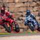 MotoGP riders racing on track during Grand Prix