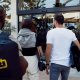 MotoGP travelers arriving at hotel with luggage